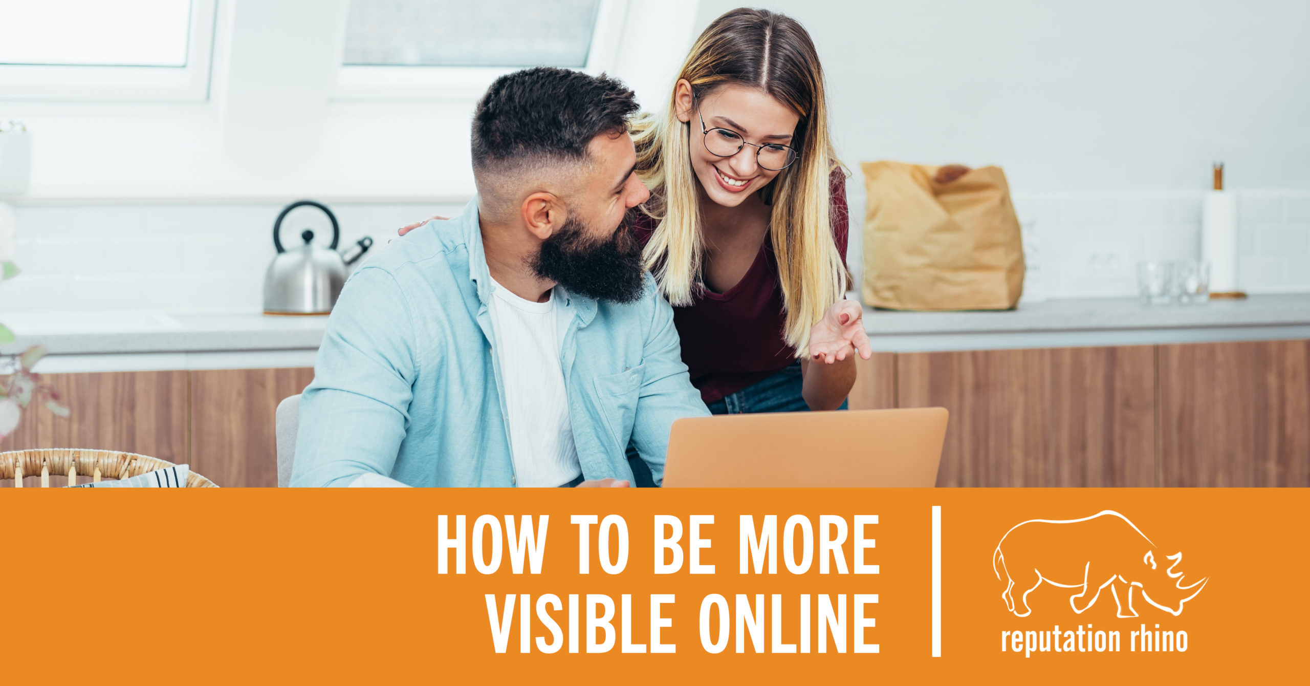 Visible online - man and woman looking at laptop