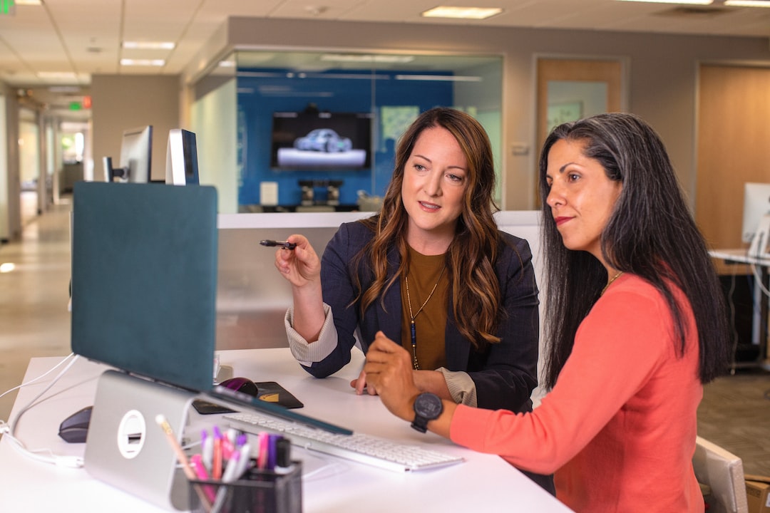 Two Woman discussing on how to remove information from mylife