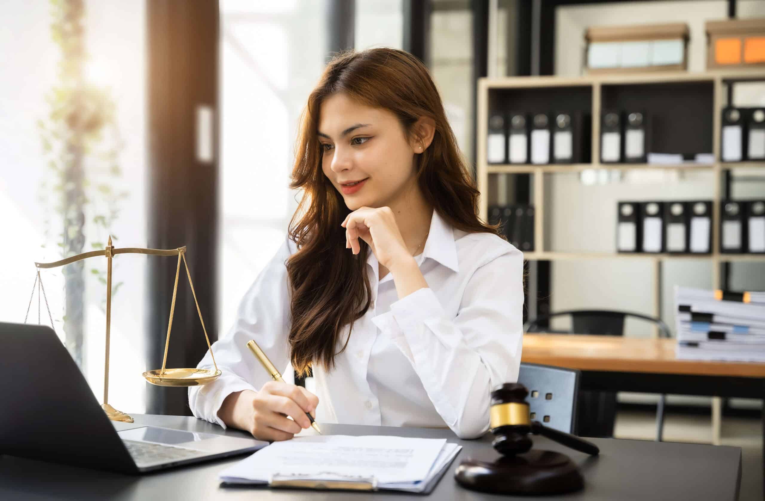 Woman searching on laptop about how to remove public records from the internet